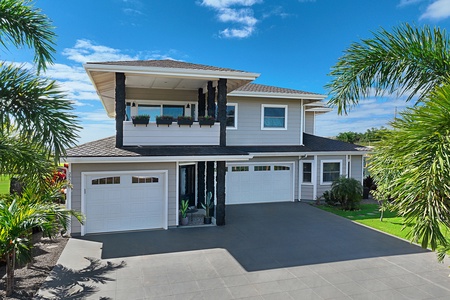 Modern exterior with a welcoming entry, covered balcony, and convenient attached garage.