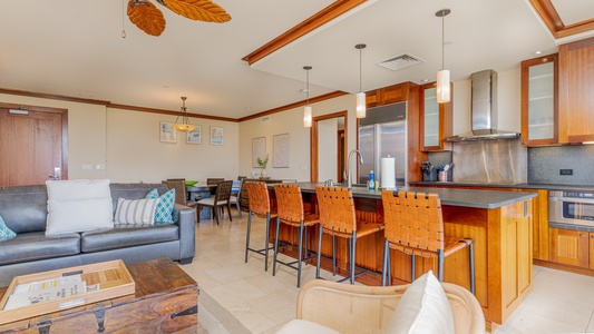 Sip a drink at the bar seating in Ko Olina Beach Villas O425 and enjoy breathtaking views.