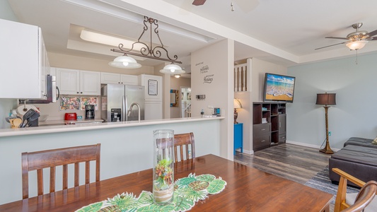 Relax in your open-concept space where the fully equipped kitchen flows into comfortable living and dining areas, perfect for memorable meals together.