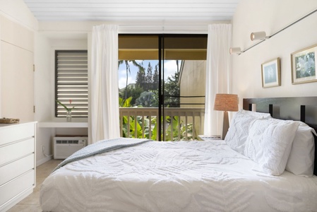 Greet the day with scenic views from your bed—this room captures the essence of peaceful island mornings.