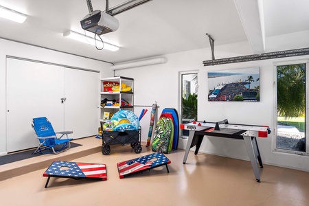 Covered garage includes beach gear, games, and fun extras to make your stay unforgettable.