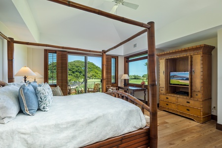 Wake up in your serene four-poster bed with stunning tropical views through shuttered windows and elegant bamboo furnishings creating your perfect island retreat.