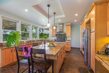 The kitchen island/bar for quick meals and entertainment.