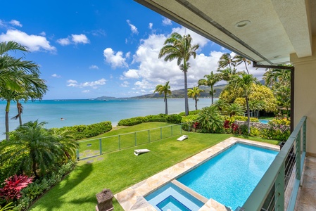 A private pool and oceanfront lawn create the perfect setting for sun-filled island afternoons.