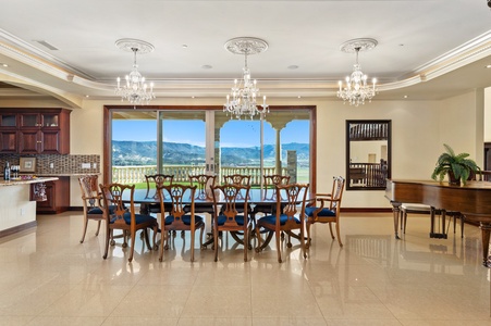 Meals run long at a table this size, enjoying it in the valley light coming through the glass.