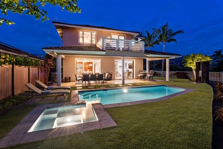 Relax poolside in the warm glow of a Hawaiian sunset.