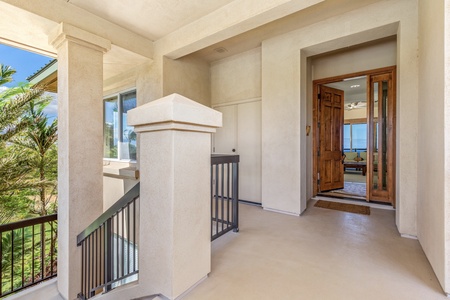 Outdoor entryway to the upper level corner condo.