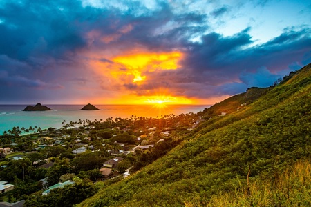Sunrise strolls on a tranquil beach with postcard-perfect scenery.