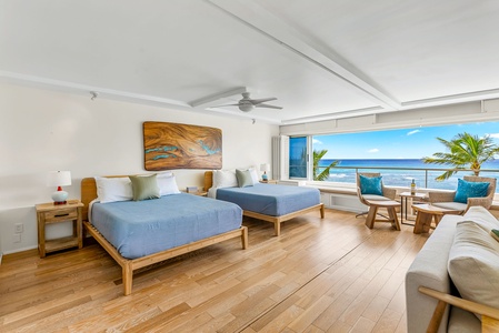 Unwind in the airy studio with two queen beds, ocean views, and a spacious layout designed for comfort and connection.