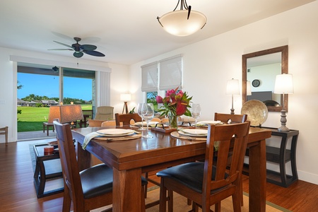 Dining room with seating for six, with views through the sliding doors.