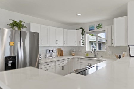 The kitchen is updated and spacious with lots of natural light