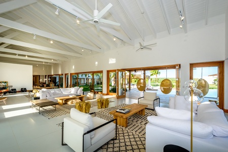 Experience seamless indoor-outdoor living in this spacious and airy home where large doors opens directly to the patio.