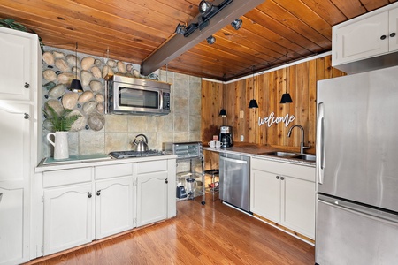 The spacious kitchen with plenty of room for meal prep and modern conveniences.