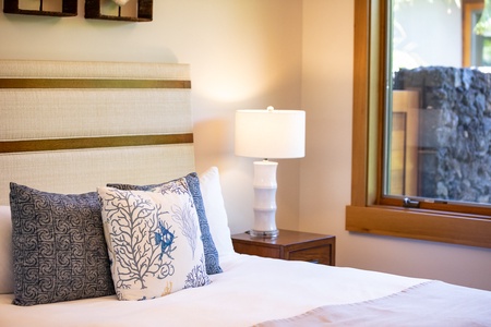 Designer pillows, coastal tones, and soft textures create a relaxing space you'll love to return to.