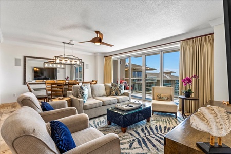 Spacious living area at Honua Kai Hokulani 825 with stylish furnishings and modern amenities.