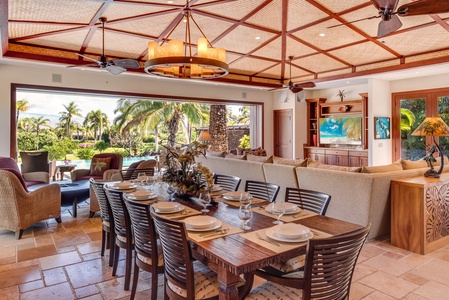 An elegant dining area with table for ten.