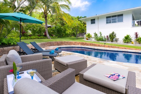 Unwind by the brand-new in-ground pool, perfect for cooling off on warm Hawaiian days.