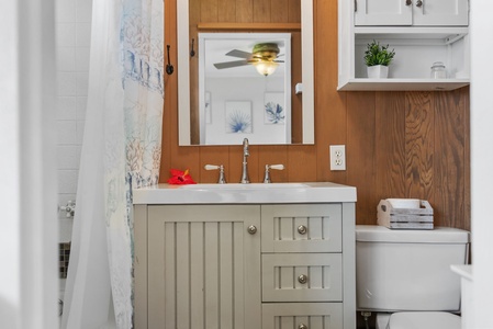 The primary bathroom offers convenience and privacy with upgraded finishes and serene style.