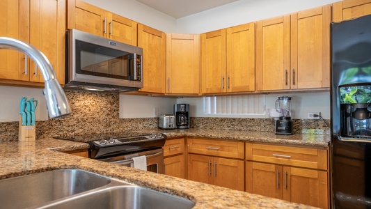 The kitchen, living room and dining room are all in an open floor plan.