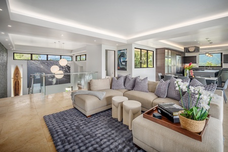 Living area equipped with a flat screen TV and Sonos sound system, perfect for movie nights and entertainment.