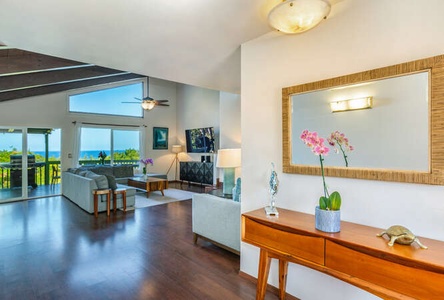 Step into Hale Ohia through a warm and welcoming entry, designed to instantly make you feel at home in this North Shore retreat.