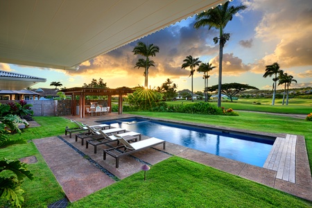 Relax poolside and take in the peaceful sunset views.