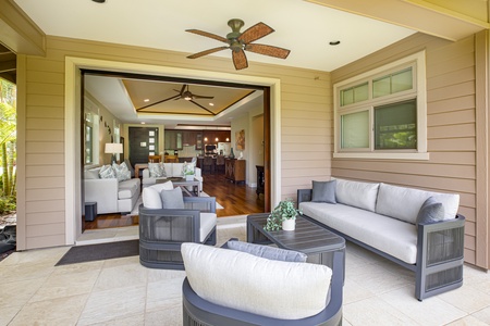 Relax and reconnect on this expansive covered lanai—perfect for evening cocktails or mid-day naps.