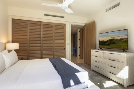 Reverse view of the second bedroom leading out to the full guest bathroom