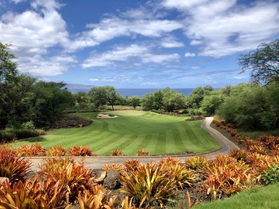 Perfect your swing at Wailea Hoolei Resort's championship golf course, with breathtaking views.