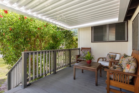 The covered lanai is a perfect spot to sip your morning coffee.