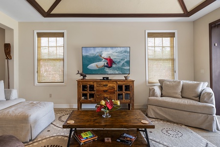 Kick back with a movie or stream your favorites in the inviting living room of Kona Blue Vacations Holua Kai.
