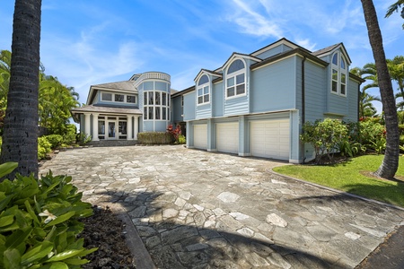 Expansive driveway with room for up to six vehicles, perfect for group travel.