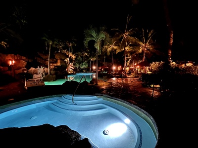 Enjoy your evening cocktails by the community pool at night.