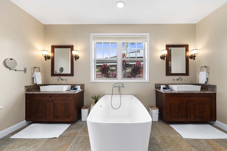 Luxurious primary bathroom with oversized soaking tub