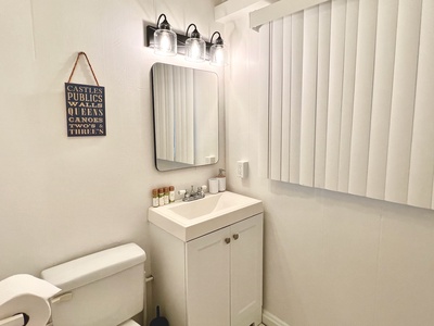 Shared bathroom for the connected bedrooms, offering convenience and privacy.
