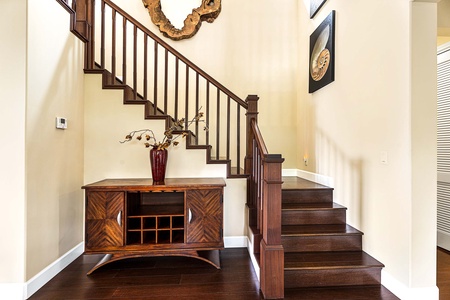 Stairs leading to the remainder of the bedrooms and upstairs living room