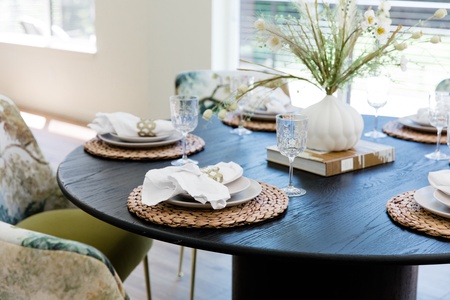 Enjoy memorable meals at the thoughtfully styled dining table, where contemporary design and natural surroundings create a welcoming setting for shared conversations.