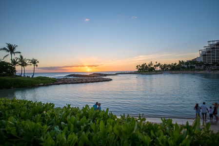 Ko Olina Lagoon 1 glows at sunset, with calm water and soft evening light.