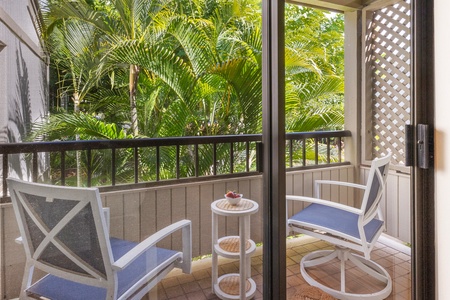 The second bedroom at Wailea Ekolu 1106 features a private lanai for your quiet morning coffee.