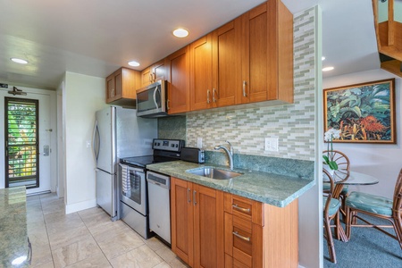 Full kitchen with appliances and essentials for simple in-unit dining.