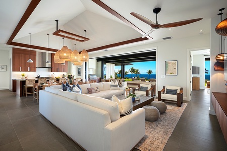 Relax in the lanai with plush seating and seamless indoor-outdoor living.