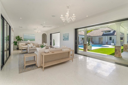 Gourmet kitchen with dual islands, premium appliances, and breezy ocean views.