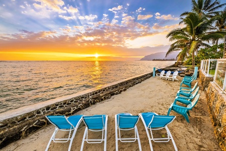 A private hot tub set at the water's edge, warm enough to stay in long past sunset.