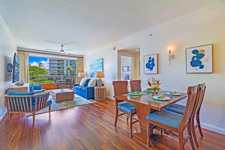 Open living and dining space with a view of the lanai.