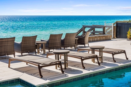 Pool side loungers and gulf facing chairs for your enjoyment