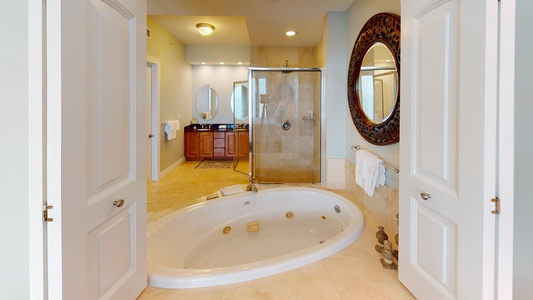 The private master bath features jacuzzi tub