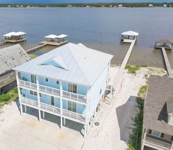 Multi-level luxury home with a private pier and boat slip