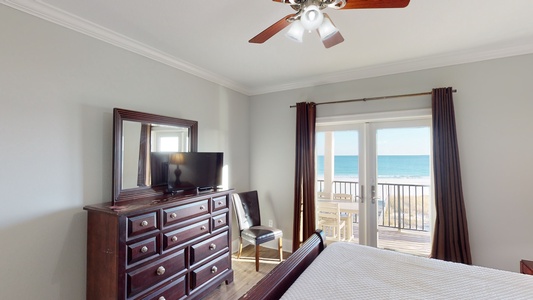 Bedroom 7 features a private bathroom, TV, ceiling fan, Gulf views and balcony access