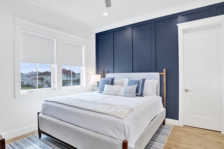This guest bedroom offers a King bed and attached bathroom (shared)
