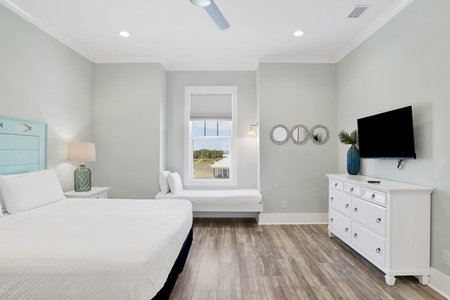 The guest bedroom offers a King bed, Twin bed and TV